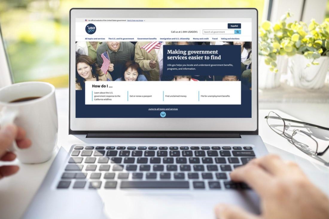 The redesigned USA.gov homepage on a laptop: Making government services easier to find, with a How do I section of common tasks